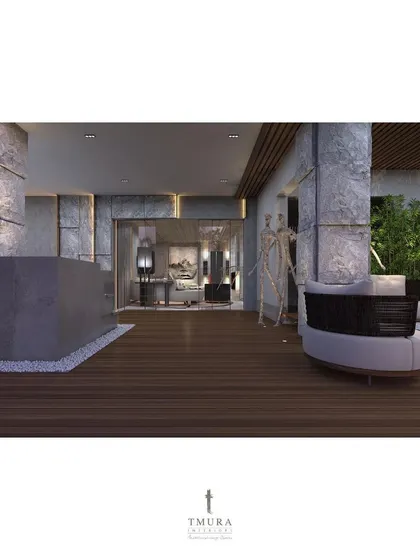 This outdoor space features a fire pit and comfortable lounge seating, creating a perfect spot for evening relaxation. The design uses natural materials like wood and stone to blend with the open-air environment.