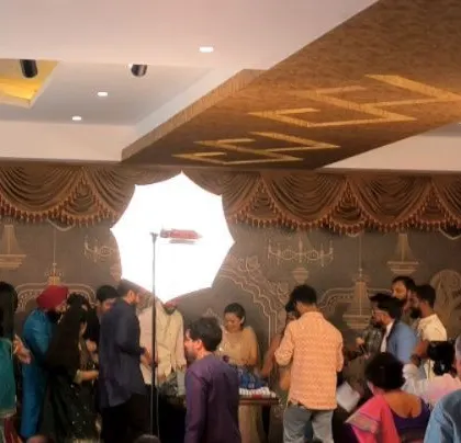 Another view of the social event, showing the elegant decor.