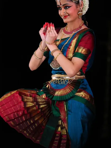 A moment of prayerful grace from Srujana's dance. Bharatanatyam is a spiritual practice, a form of devotion that connects the dancer to something larger than themselves.