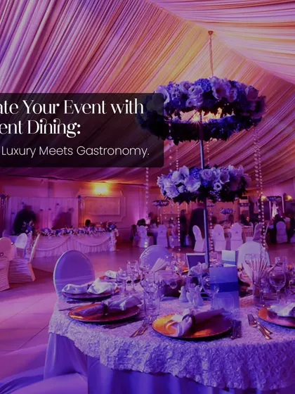 We elevate your event with opulent dining where luxury meets gastronomy. This image of a beautifully set table in a grand, purple-lit hall showcases the magnificent ambiance we can create.