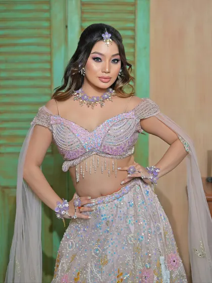 This is for your fun pre-wedding functions. My floral jewellery collection, like this whimsical lilac set, is perfect for a Haldi or Mehendi ceremony. It's lightweight, fresh, and designed to make your photos pop with color and joy.