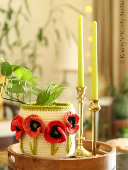 This Remembrance Poppy Basket combines delicate crochet poppies with embroidered stems and leaves. I love exploring how different textile arts can come together in one piece.
