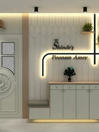 A beautiful entrance design concept. This image shows a plan for a white carved door, a shoe cabinet with a seating area, and a custom backlit nameplate, showcasing our design capabilities.
