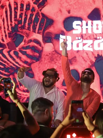 Me and my partner on the decks in Raipur, with the crowd capturing the moment.