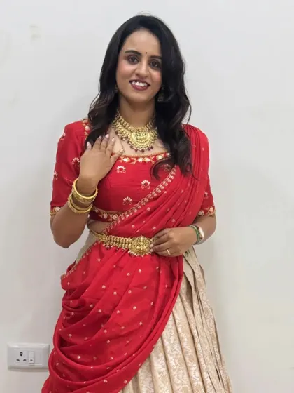 My Navaratri Day 6 look. A custom red and cream half saree, embodying the strength and passion of the color red.