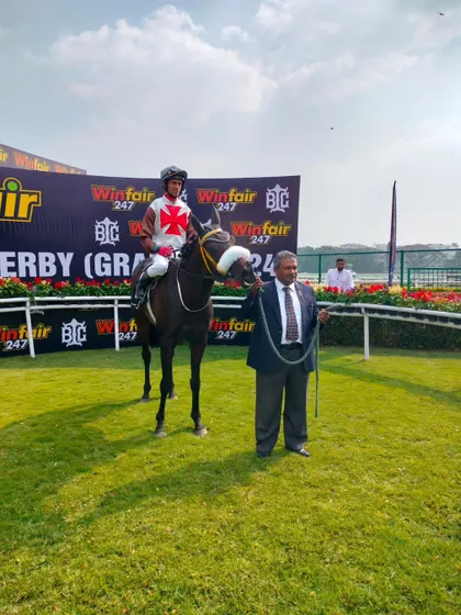 Maple Leaf, with jockey P. Trevor, after winning The Stewards Gold Cup.