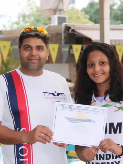 It is an honor to guide talented swimmers on their journey. Posing with a student and her certificate is a proud moment that reflects our shared commitment.