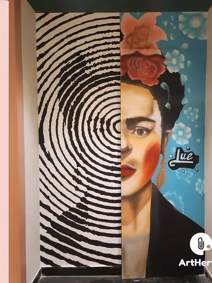 A unique and conceptual portrait of Frida Kahlo merged with a fingerprint design. This piece, painted in Moradabad, is a powerful statement about identity and artistry.