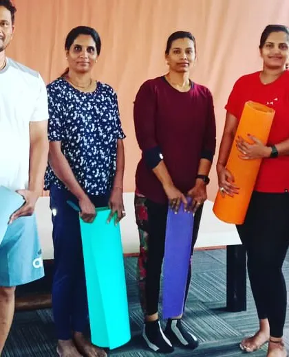 Another shot of our members prepared for their yoga class. The consistency and dedication of our community is what helps everyone achieve their personal wellness goals.