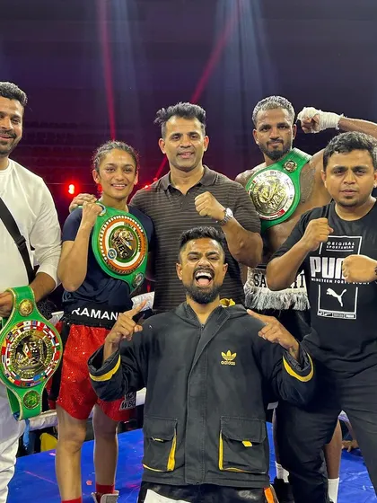 A team of champions. Our fighters and promoters celebrating with their newly won WBC title belts.