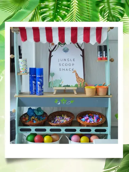 A "Jungle Scoop Shack" activity station, where kids could create their own treats, adding another layer of interactive fun to the party.