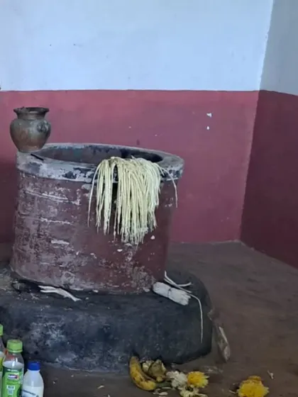 The symbolic well at the temple, part of a fascinating local legend involving a dinosaur like creature.