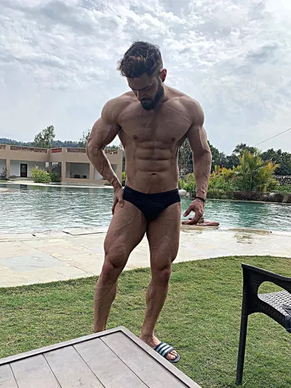 Your fitness journey goes beyond the gym. Maintaining a lean physique allows you to be confident and healthy in any environment, like by the pool.