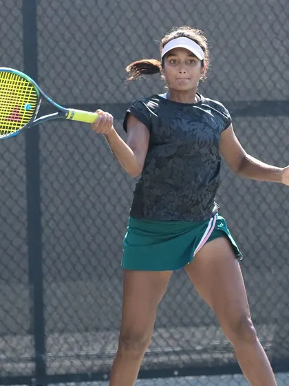 A focused backhand from Sahaja, demonstrating the precision and power she brings to every match.