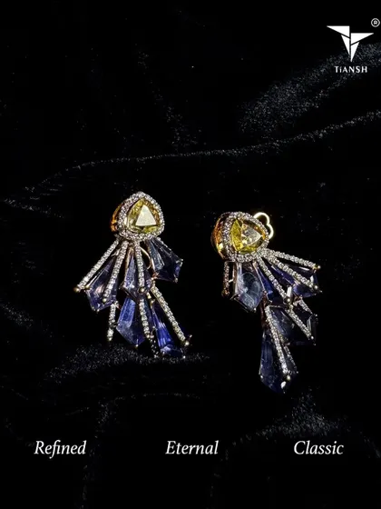 Discover new designs that feel refined, eternal, and classic. These gemstone earrings, with their unique fan shape, are like a piece of modern art for your ears.
