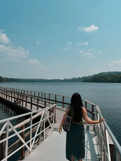 Walking along the long boardwalk in Huntsville, enjoying the expansive water views.