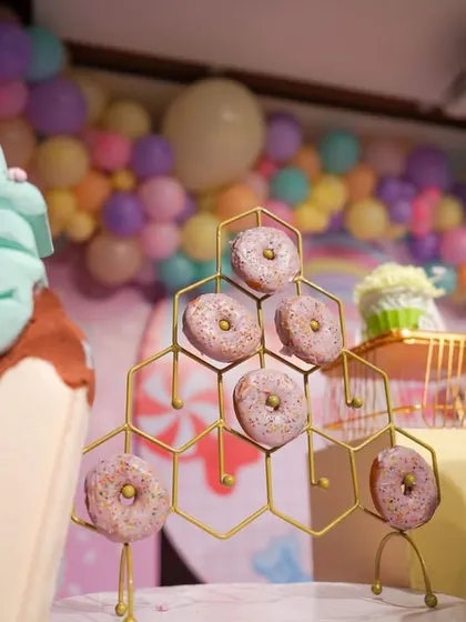 A close-up of the donut display, a popular and delicious interactive element for a sweet-themed party.