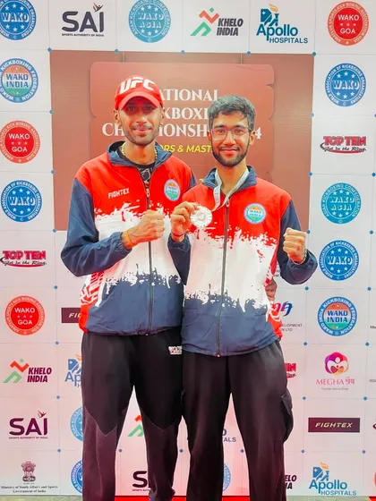 Two of our senior fighters proudly displaying their silver medals at the WAKO National Kickboxing Championship. A great achievement for them and the gym.