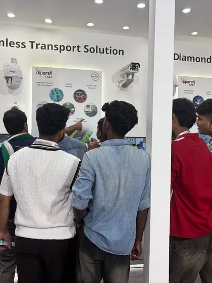 Visitors at AutoSec 2025 keenly observing a demonstration of my Seamless Transport Solution. My goal is to make complex technology accessible and understandable.