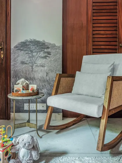 For this cozy corner, I designed a custom wooden rocking chair with cane accents. It’s the perfect spot for quiet moments, cuddles, and bedtime stories with mom and dad.