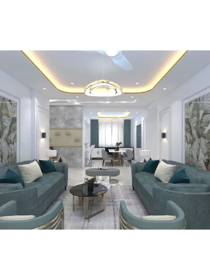 A living room design that plays with symmetry and color. Two identical sofas face each other, creating a conversational layout, while the blue and green tones add a refreshing touch.