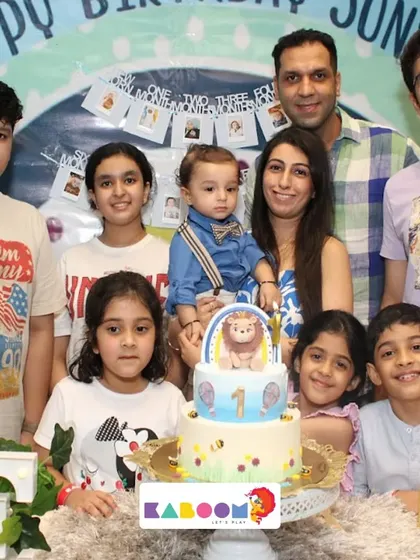 A big family photo around the birthday cake! These are the precious memories we help create every day.