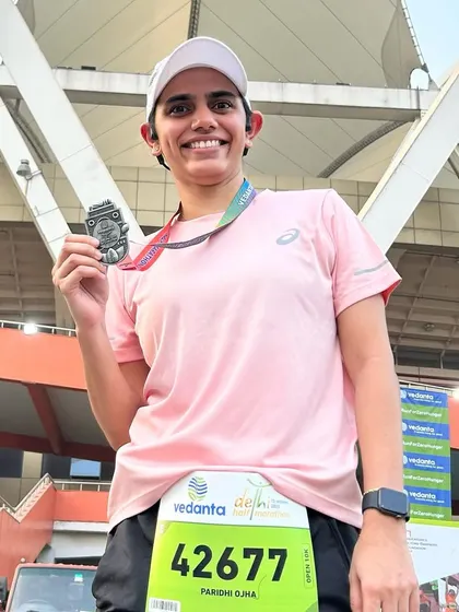 Getting back to running after an ankle fracture was not easy, but you have to do what you have to do. Celebrating a finish at the Vedanta Delhi Half Marathon.