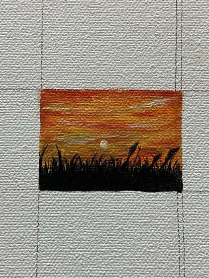 Day 37 of the project: a mini-painting of a sunset over a field of grass, as suggested by a follower.