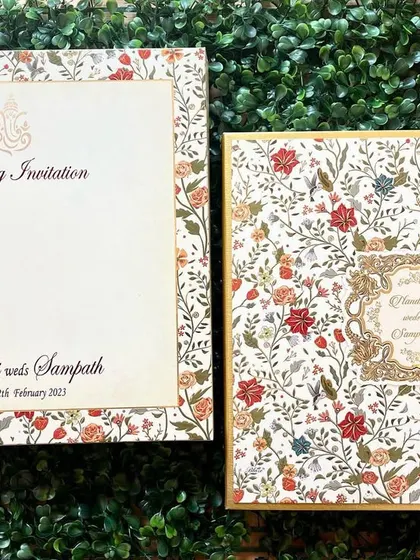 A classic floral invitation with a timeless design. The matching box and insert create a cohesive and elegant look.