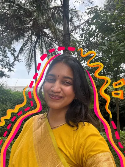 A sunny selfie in a yellow saree, with doodles that match the bright and happy mood.
