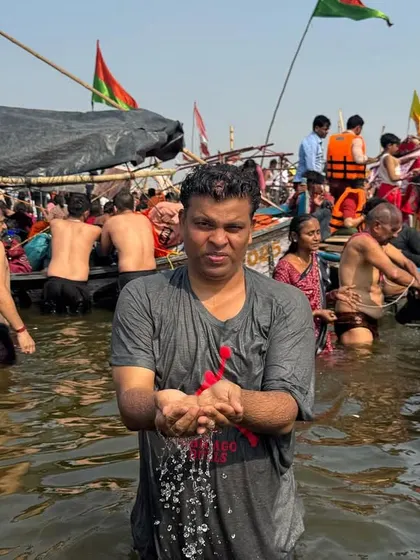 Taking a dip during the Kumbh Mela in Prayagraj. This ancient spiritual gathering is more than a ritual; it is a profound meeting of worldly people and ascetics, a constant reminder of our spiritual goals.