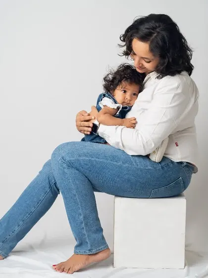 A quiet, tender moment between a mother and her baby. Even in a full family session, we make sure to capture these individual connections that are so precious.