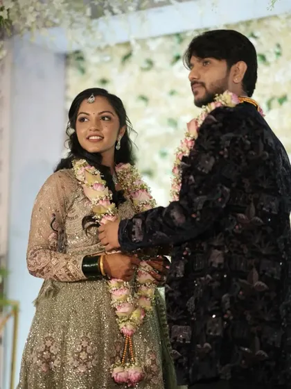 A moment from the engagement ceremony. The bride's makeup is flawless, and she looks radiant and happy.