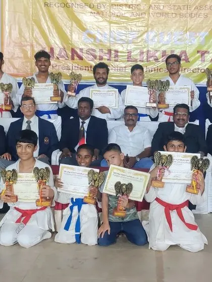 A group photo of our team with their trophies from the SKI and NSKFI National Cup. Moments like these build a strong sense of community and shared accomplishment.