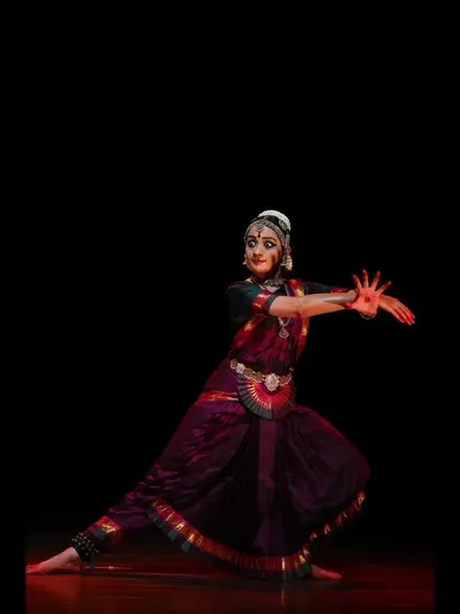 A powerful pose with dramatic lighting, capturing the intensity of the Nayika's emotions.