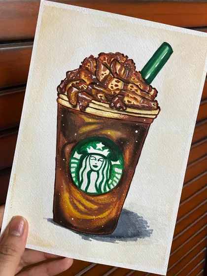 My take on a Starbucks Frappuccino, drawn with markers. I had fun recreating the details, from the iconic green logo to the texture of the whipped cream and chocolate drizzle.