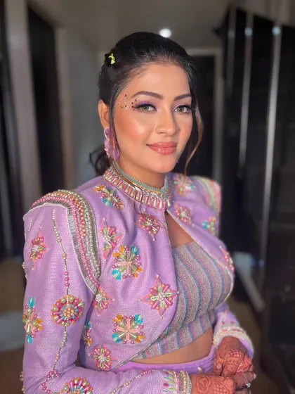 The complete look is a perfect blend of glamour and fun, ideal for a themed pre-wedding event.
