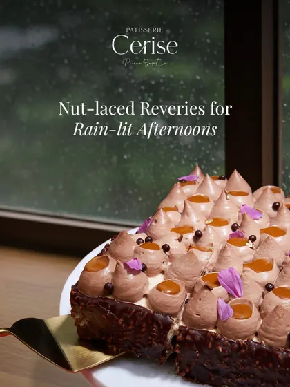 A slice of my nut-laced entremet, perfect for a quiet, rain-lit afternoon. The piped mousse and drops of caramel create a landscape of flavour, showcasing my love for pairing bold tastes with subtle, imaginative details.