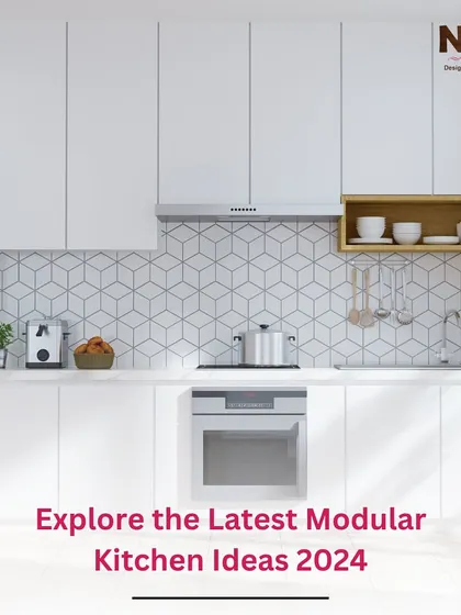 An example of a modern, all-white modular kitchen. The geometric backsplash adds a subtle pattern, and the open wooden shelf provides a warm contrast.