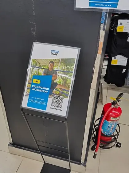 Another view of our workshop promotion inside the Decathlon store, placed to catch the eye of fitness enthusiasts.