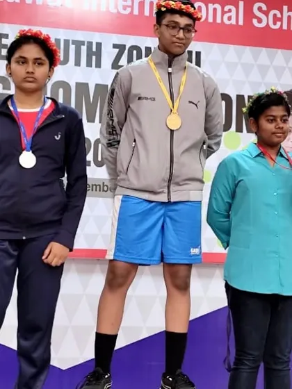 Aiman Mulani on the podium after winning his silver medal.