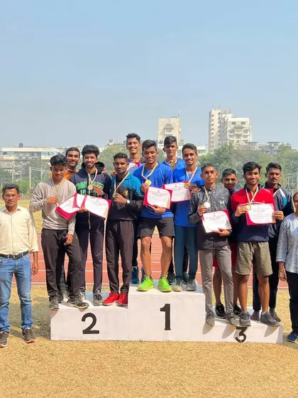 The victorious 4x400m relay team on the podium at the Mumbai University Zonal meet. A dominant team performance.