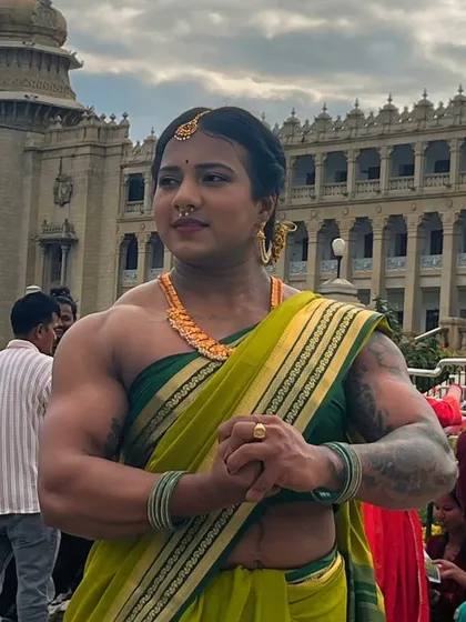 Standing in front of the Vidhana Soudha, this image in a green saree is a powerful symbol of my identity as a strong woman from Karnataka.