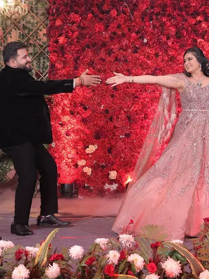 A fun, playful moment during the couple's sangeet dance. I always build in moments that reflect the couple's personality, making the performance feel authentic and joyful.