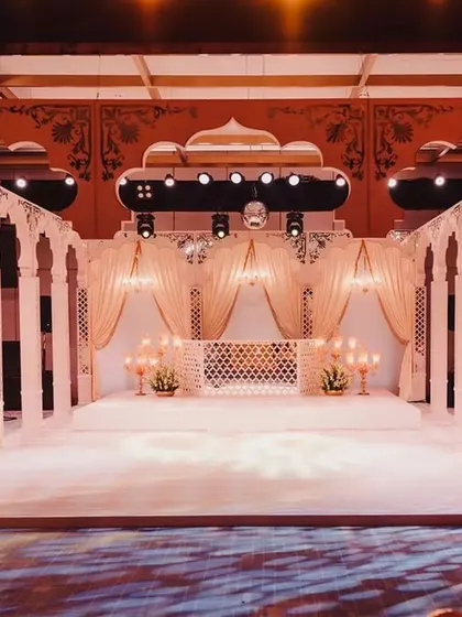 This is what I call a showstopper. For this engagement, we brought the magic of Rajasthan's mystical Mahals to life, creating an opulent palace courtyard that was nothing short of a royal gathering.