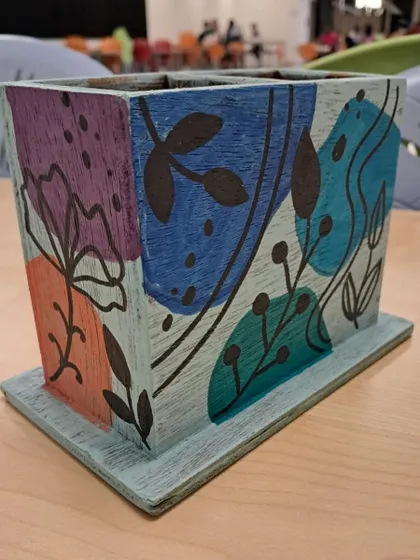 This student used a cool colour palette of blues and purples for their boho pencil stand.