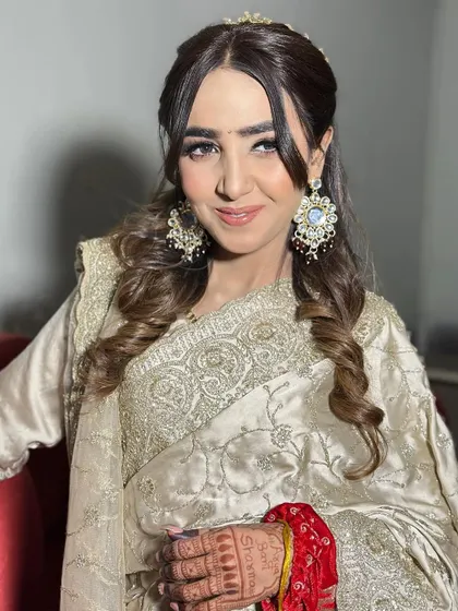 Unfiltered and beautiful. This close-up shows the details of her engagement makeup, with soft brown smokey eyes and a flawless base that looks like real skin.