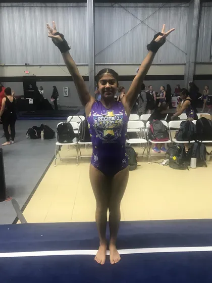 This Platinum gymnast is ready to compete at regionals, showing off her strength and focus.