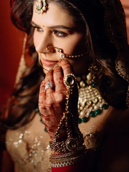 A detailed shot of a bride's look, with her hair in elegant waves.
