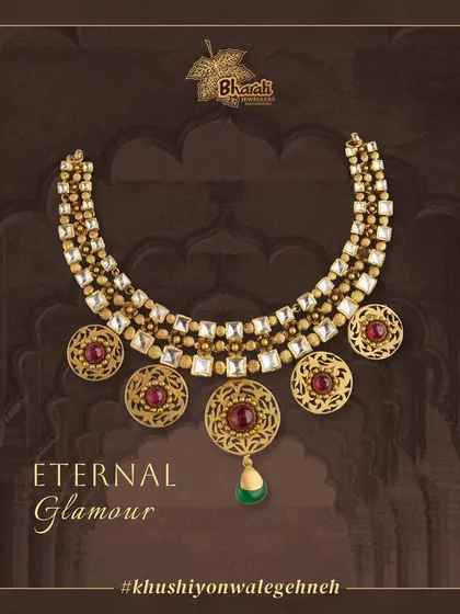 Adorn yourself with eternal glamour. This luxurious necklace features the captivating charm of pearls, diamonds, and large Kundan stones, enhanced by stunning filigree discs with ruby-colored centers.